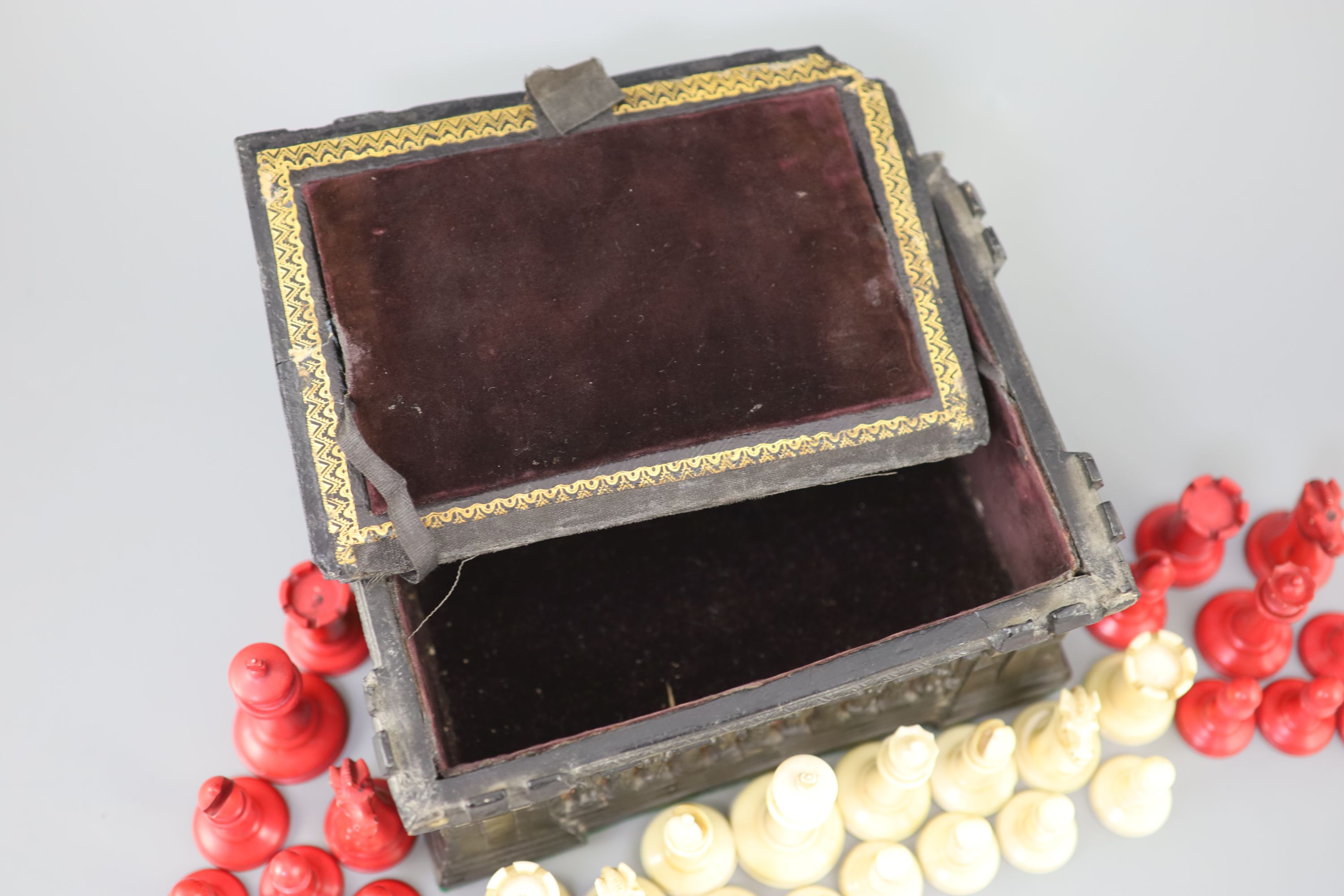 A Jaques London red and white ivory 2¾ Staunton chess set, c.1850, 8.25 x 6 x 4in.